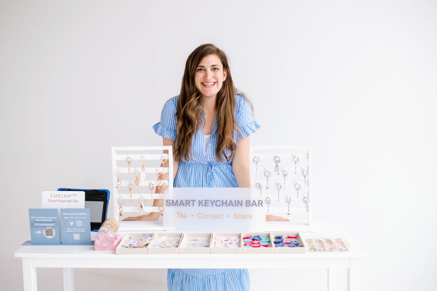 The TapLoop Smart Keychain Bar, staffed and ready — tap, connect, share